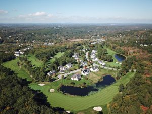 aerial drone photography of a neighborhood and golf course